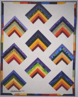 Rainbows in the Clouds Quilt - 38" x 48"