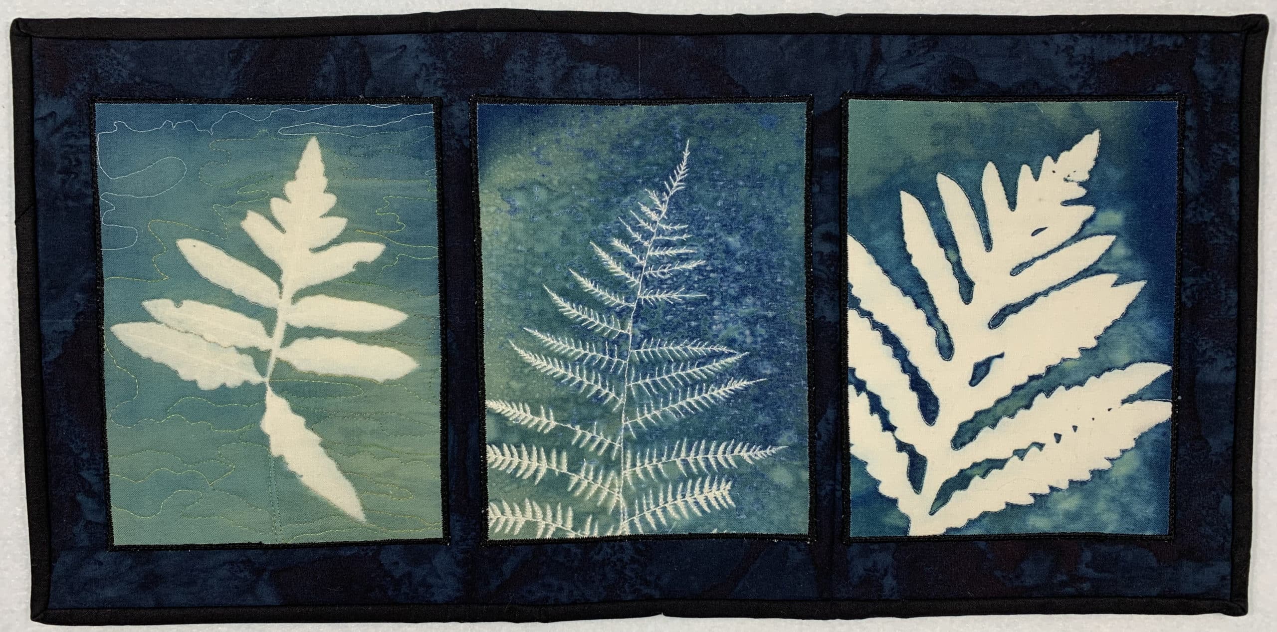 quilt of 3 cyanotype fern leaves