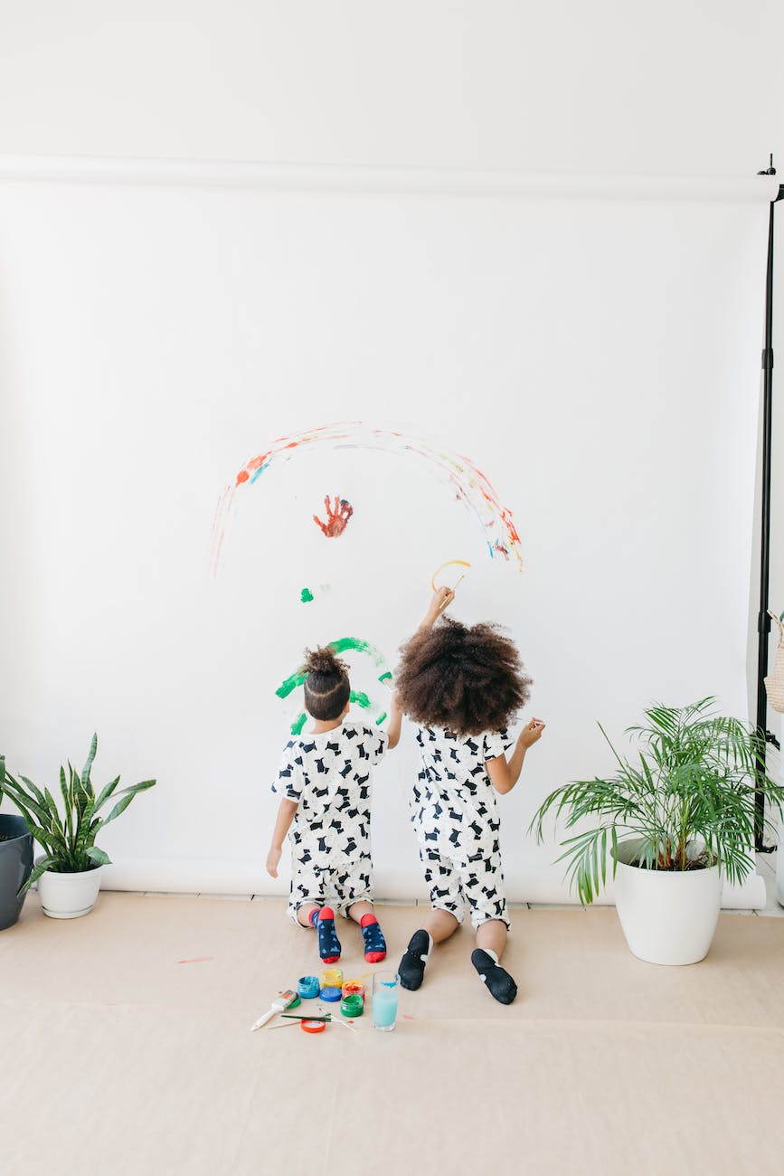 kids painting a backdrop