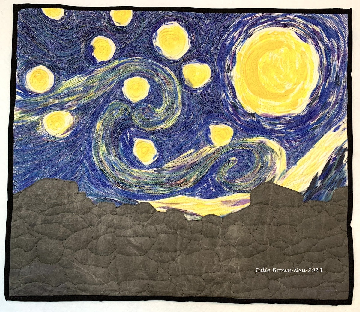Recreation Van Gogh's Starry Night using thread painting with stone wall in foreground